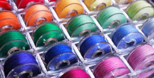Sewing machine bobbins, bobbin case, bobbin storage box