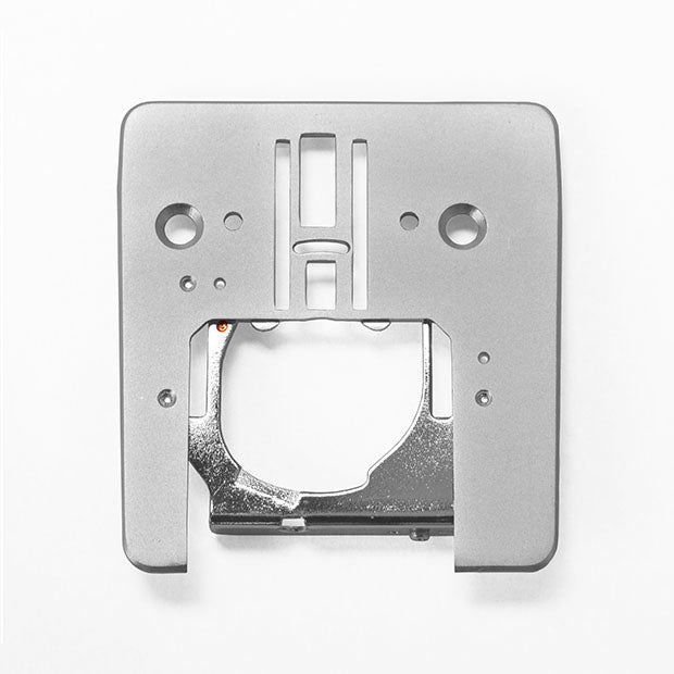 Needle plate for Toyota SP10 and SP20 series sewing machines